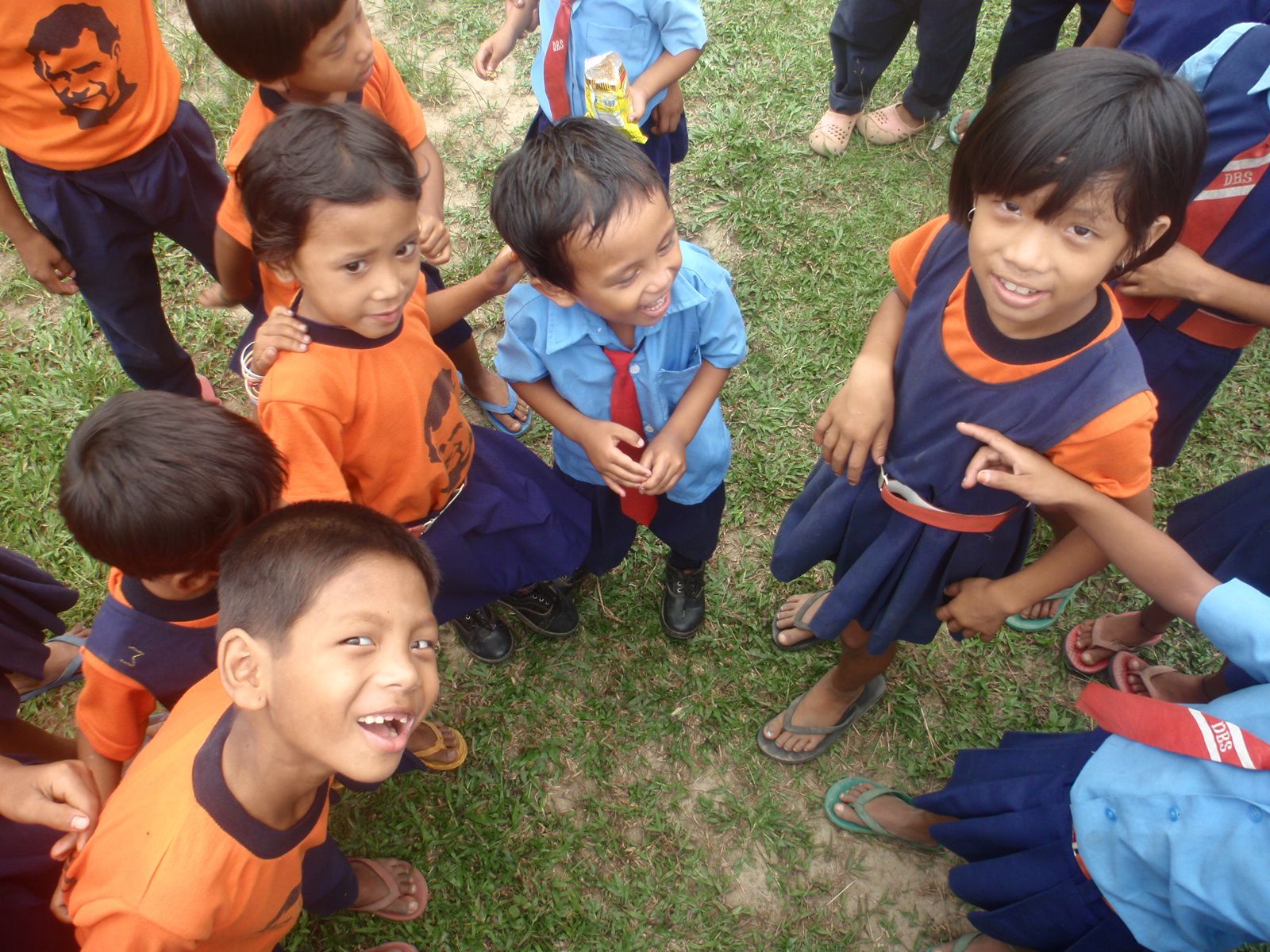 kids from Ottongkhua look up at the camera